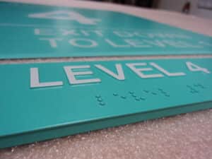 Graphic Components, wholesale ADA manufacturing, wholesale braille signs, vandal resistant, NOVA Polymers